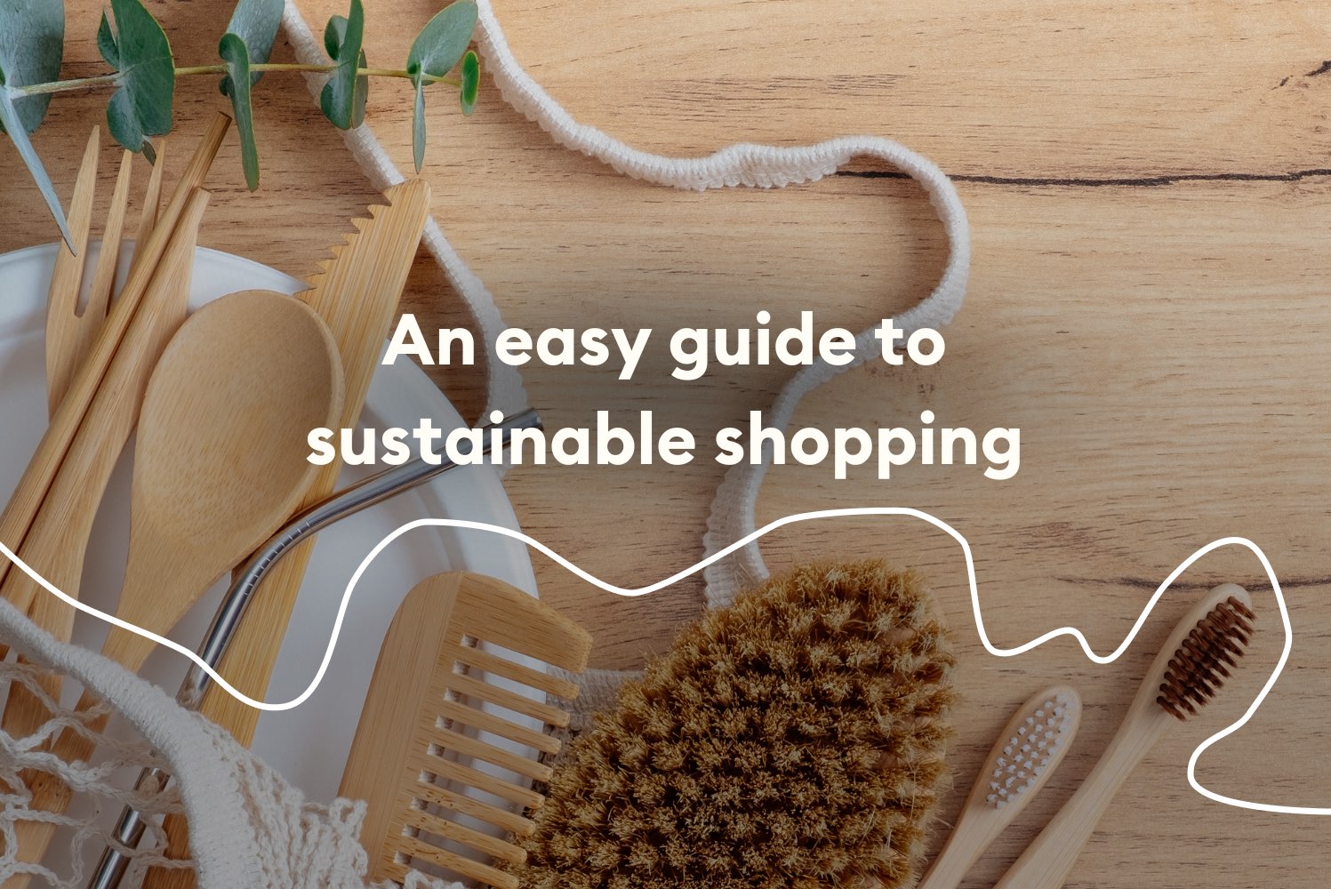 Sustainable shopping utensils laying on a wooden table